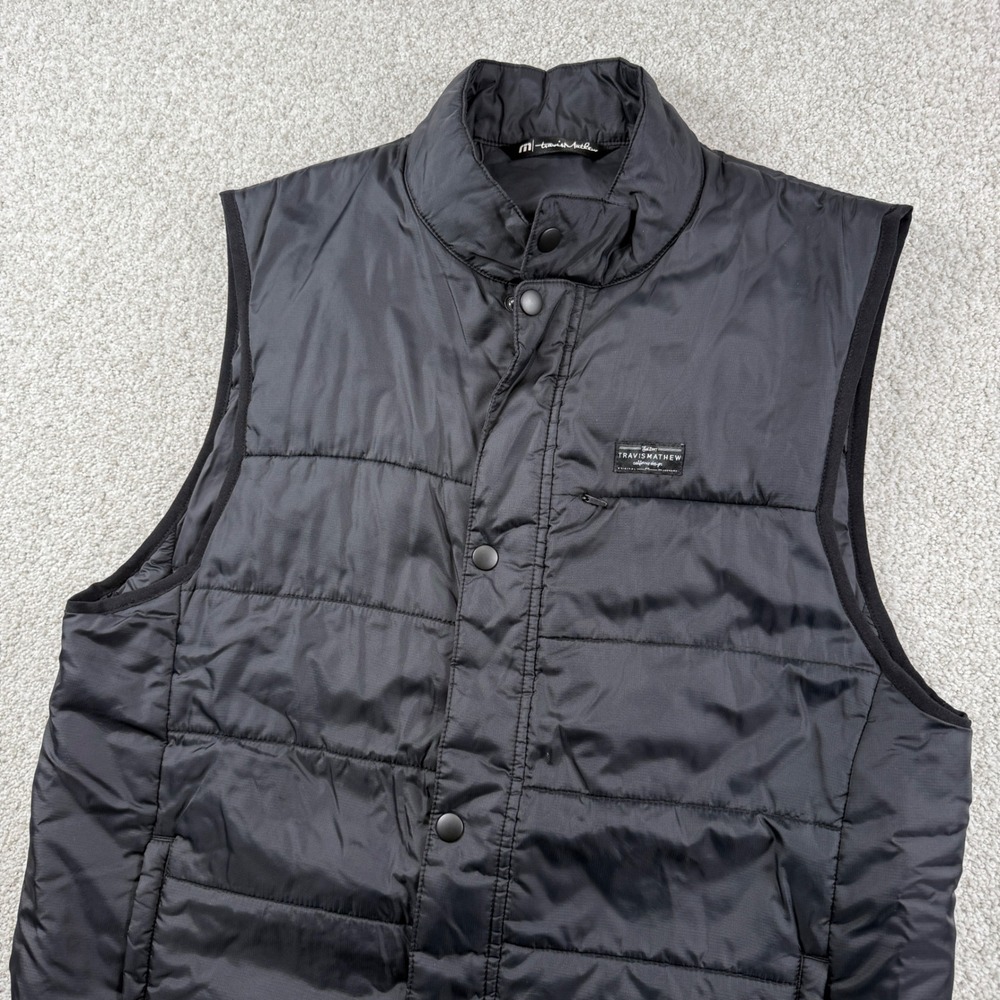 TravisMathew Puffer Vest Men M Black Quilted Ripstop‎ Full Zip Snap Front Golf